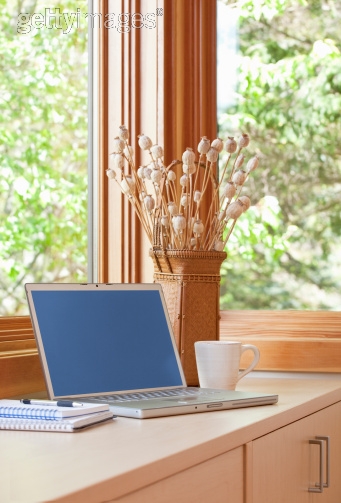 Royalty-free Image: Home office with view of green trees